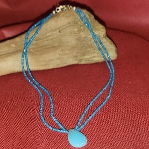 Blue Beaded Necklace with Teardrop Pendant
